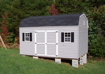 12 x 16 V-High Barn with flint siding, onyx black shingles, black shutters and white trim