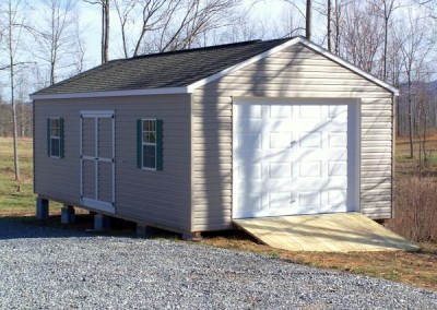 14 x 28 V-A-roof Garage with clay siding, white trim, driftwood shingles, and forest green shutters