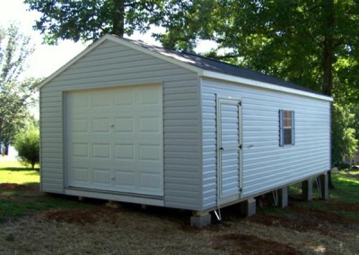14 x 28 V-A-roof Garage with gray siding, white trim, estate gray shingles and pacific blue shutters