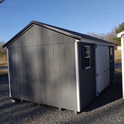 10 x 16 size painted a-roof style shed with gray siding, white trim, black metal roof, black shutters, fiber solid 6 foot shed doors and two windows.