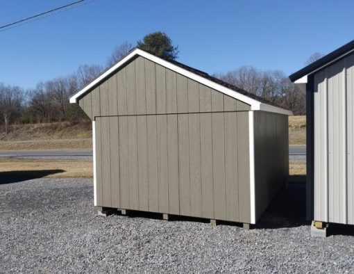 10 x 16 size painted carriage style shed with clay siding, white trim, brownwood architectural shingle roof, redwood shutters, 8' ridgevent, fiber top circle 6 foot doors, two windows.