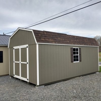 12 x 20 size painted high barn style shed with clay siding, white trim, brownwood architectural shingle roof, brown shutters, 8' ridge vent, ggs 6 foot doors, two windows.