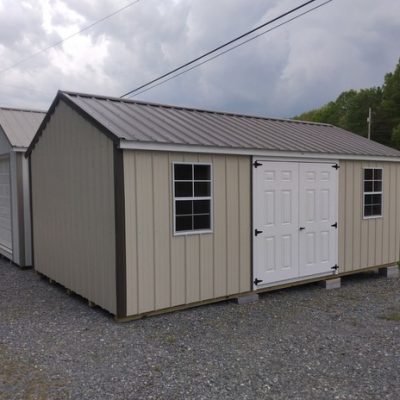 12x20 size metal a-roof style shed with white trim, light stone metal siding, burnished slate metal roof, corners and j channel, 6 foot fiber doors and two windows.