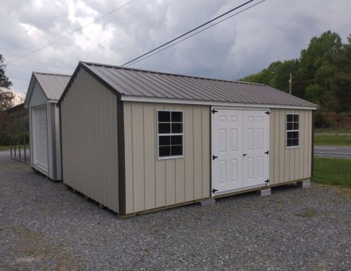 12x20 size metal a-roof style shed with white trim, light stone metal siding, burnished slate metal roof, corners and j channel, 6 foot fiber doors and two windows.