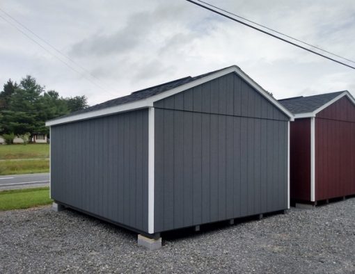 12 x 16 size painted a-roof style shed with gray siding, white trim, black architectural shingle roof, black shutters, 8' ridgevent, fiber solid 6 foot shed doors, two windows.