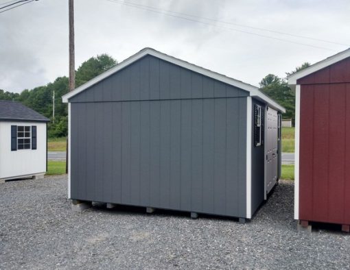 12 x 16 size painted a-roof style shed with gray siding, white trim, black architectural shingle roof, black shutters, 8' ridgevent, fiber solid 6 foot shed doors, two windows.