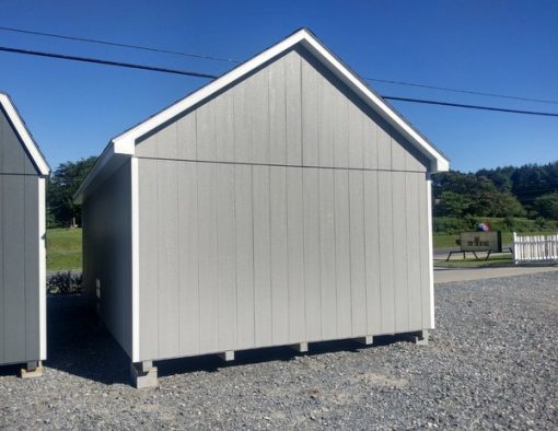 12 x 20 size painted garden style shed with gap gray siding, white trim, black architectural shingle roof, black shutters, (2) 8' ridge vents, fiber transom 6 foot shed doors, two windows.