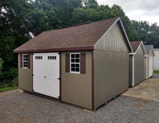 12 x 16 size painted garden style shed with clay siding, brown trim, brownwood architectural shingle roof, brown shutters, 8' ridge vent, fiber transom 6 foot shed doors, two windows.