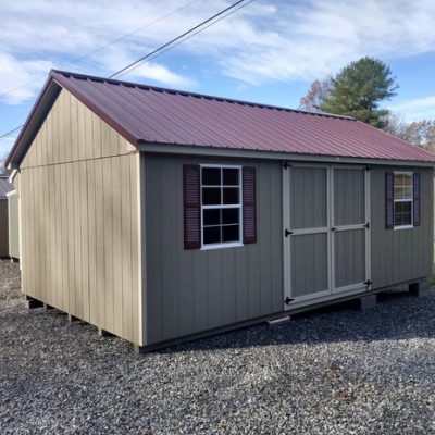 12 x 20 size painted classic style shed with clay siding, clay trim, burgundy metal roof, burgundy shutters, ggs 6 foot doors and two windows.