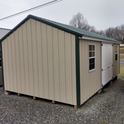12x20 size metal a-roof style shed with white trim, light stone metal siding, hunter green metal roof, corners and j channel, 6 foot fiber 2 plank doors with two windows.