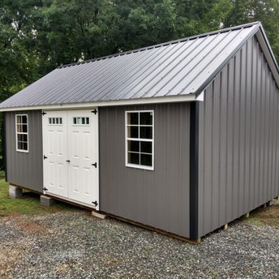 12x20 size metal garden style shed with white trim, charcoal metal siding, black metal roof, corners and j channel, 6 foot fiber transom doors with two windows.