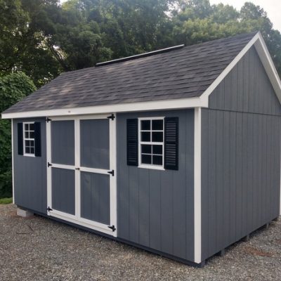 10 x 16 size painted garden style shed with gray siding, white trim, black architectural shingle roof, black shutters, 8' ridge vent, ggs 6 foot doors, two windows.