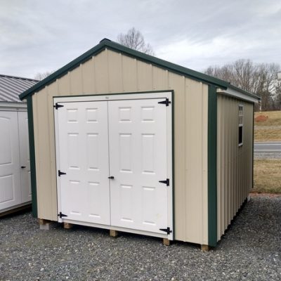 10x12 size metal a-roof style shed with white trim, light stone metal siding, hunter metal roof, corners and j channel, 6 foot fiber solid shed doors with two windows.