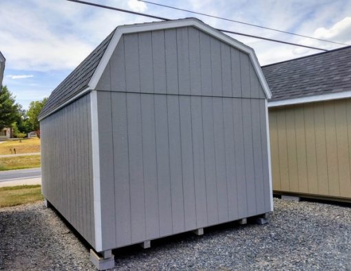 10 x 16 size painted high barn style shed with gap gray siding, white trim, black architectural shingle roof, black shutters, (1) 8' ridge vent, ggs 6 foot double doors, two black windows.