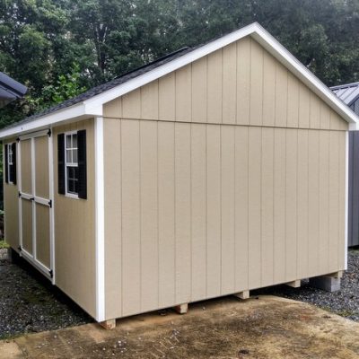 12 x 16 size painted classic style shed with tan siding, white trim, black architectural shingle roof, black shutters, (1) 8' ridge vent, ggs 6 foot double doors, two windows.