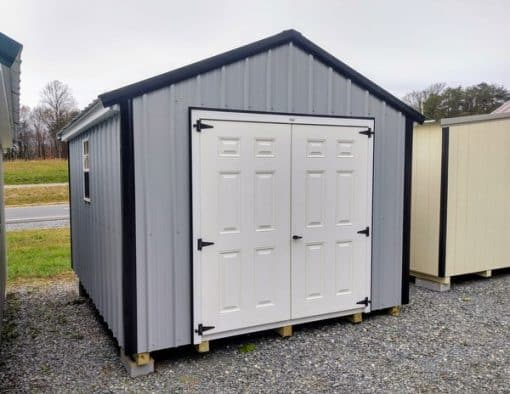 10x12 size metal a-roof style shed with white trim, old town gray metal siding, black metal roof, corners and j channel, 6 foot fiber double shed doors with two windows.