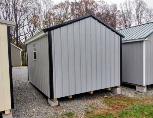 10x12 size metal a-roof style shed with white trim, old town gray metal siding, black metal roof, corners and j channel, 6 foot fiber double shed doors with two windows.