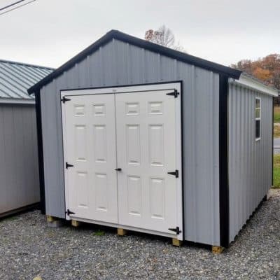 10x12 size metal a-roof style shed with white trim, old town gray metal siding, black metal roof, corners and j channel, 6 foot fiber double shed doors with two windows.