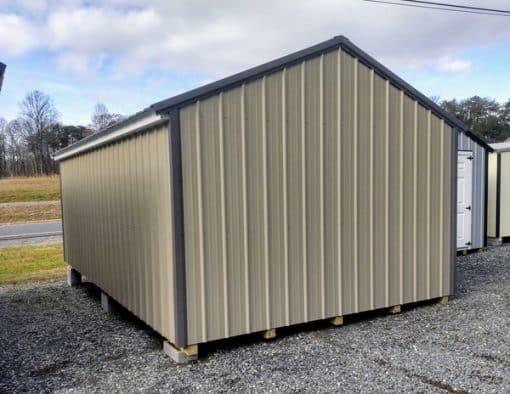 12x20 size metal a-roof style shed with white trim, desert sand metal siding, charcoal metal roof, corners and j channel, 6 foot fiber double shed doors with two windows.