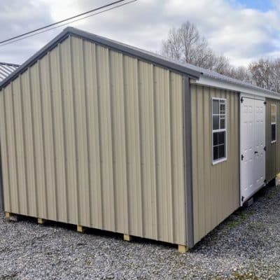 12x20 size metal a-roof style shed with white trim, desert sand metal siding, charcoal metal roof, corners and j channel, 6 foot fiber double shed doors with two windows.