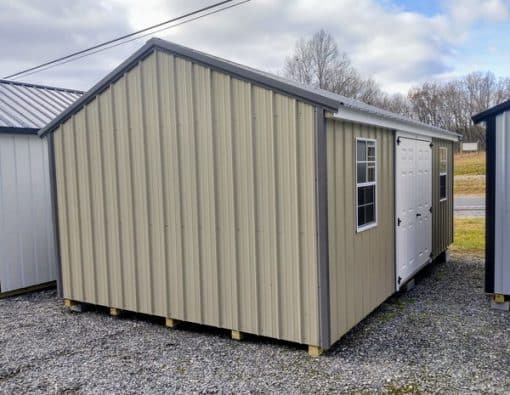 12x20 size metal a-roof style shed with white trim, desert sand metal siding, charcoal metal roof, corners and j channel, 6 foot fiber double shed doors with two windows.