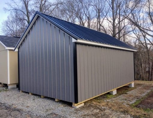 12x20 size metal garden style shed with white trim, charcoal metal siding, black metal roof, corners and j channel, 6 foot fiber double shed doors with two windows.