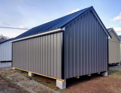 12x20 size metal garden style shed with white trim, charcoal metal siding, black metal roof, corners and j channel, 6 foot fiber double shed doors with two windows.