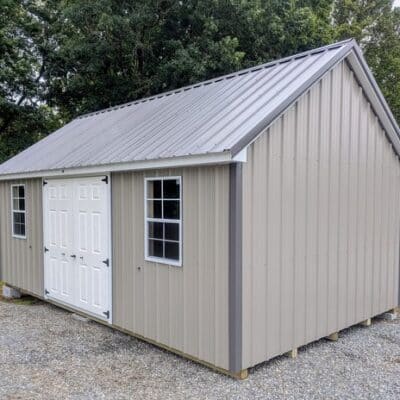 12x20 size metal garden style shed with white trim, taupe metal siding, charcoal metal roof, corners and j channel, 6 foot fiber double shed doors with two windows.