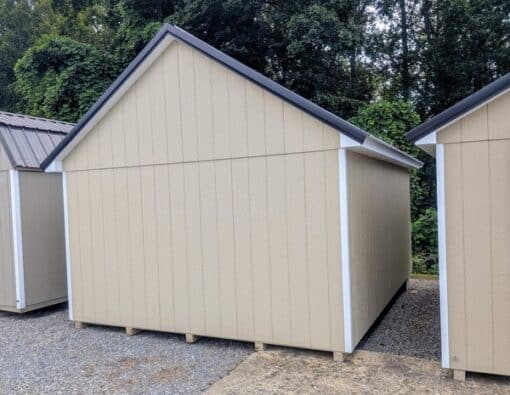 12 x 16 size painted garden style shed with leola almond siding, white trim, black metal roof, black shutters, ggs 6 foot double doors, two windows.
