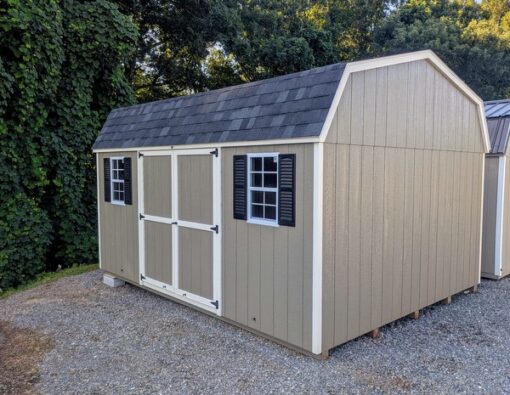 12 x 16 size painted high barn style shed with clay siding, pearl trim, black architectural shingle roof, black shutters, (1) 8' ridge vent, ggs 6 foot double doors, two windows.