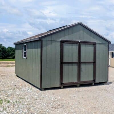 12 x 16 size painted a-roof style shed with avocado siding, brown trim, brownwood architectural shingle roof, brown shutters, (1) 8' ridge vent, ggs 6 foot double doors, two windows.