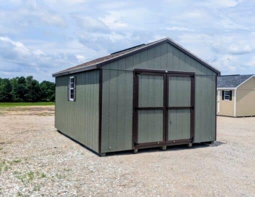 12 x 16 size painted a-roof style shed with avocado siding, brown trim, brownwood architectural shingle roof, brown shutters, (1) 8' ridge vent, ggs 6 foot double doors, two windows.