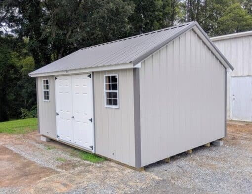 12x16 size metal classic style shed with white trim, gray metal siding, charcoal metal roof, corners and j channel, 6 foot fiber double shed doors with two windows.