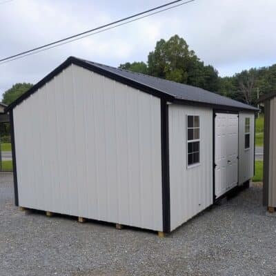 12x20 size metal a-roof style shed with black trim, alamo metal siding, black metal roof, corners and j channel, 6 foot fiber double shed doors with two windows.
