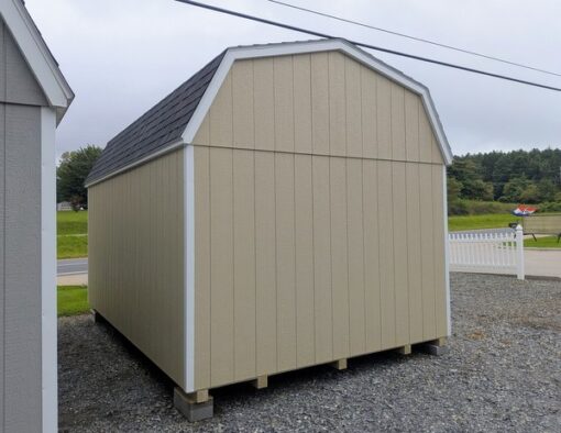 10 x 16 size painted high barn style shed with leola almond siding, white trim, black architectural shingle roof, black shutters, (1) 8' ridge vent, ggs 6 foot double doors, two windows.
