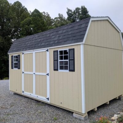10 x 16 size painted high barn style shed with leola almond siding, white trim, black architectural shingle roof, black shutters, (1) 8' ridge vent, ggs 6 foot double doors, two windows.