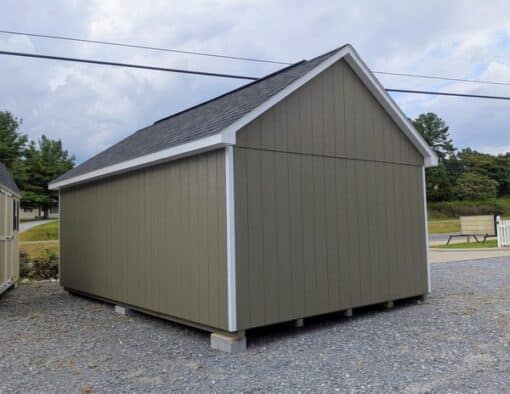 12 x 20 size painted garden style shed with clay siding, white trim, black architectural shingle roof, black shutters, (2) 8' ridge vents, ggs 6 foot double doors, two windows.