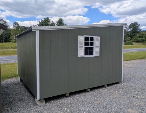 12x12 size painted economy style shed with avocado siding, white trim, alamo metal roof, white shutters, ggs 6 foot doors with two windows.