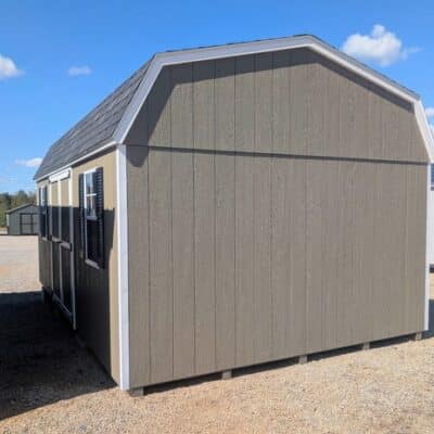 12 x 20 size painted high barn style shed with clay siding, white trim, black architectural shingle roof, black shutters, (2) 8' ridge vents, ggs 6 foot double doors, two windows.