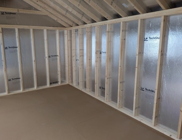 12x20 size vinyl classic roof style shed with mist siding, white trim, estate gray architectural shingle roof, black shutters. has (2) 8' ridge vents, 6 foot fiber double doors and two windows.