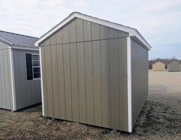 8 x 12 size painted a-roof style shed with clay siding, white trim, driftwood architectural shingle roof, black shutters, (1) 8' ridge vent, fiber solid 6 foot double doors, one window.