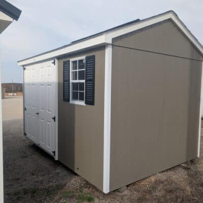 8 x 12 size painted a-roof style shed with clay siding, white trim, driftwood architectural shingle roof, black shutters, (1) 8' ridge vent, fiber solid 6 foot double doors, one window.