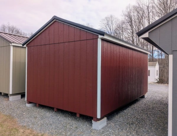 10 x 16 size painted a-roof style shed with pinnacle red siding, white trim, black metal roof, white shutters, ggs 6 foot double doors, two windows.