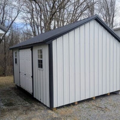 12x16 size metal classic style shed with black trim, alamo metal siding, black metal roof, corners and j channel, 6 foot fiber double shed doors with two windows.