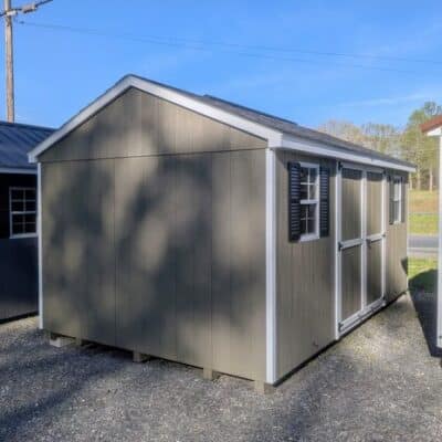 10 x 16 size painted a-roof style shed with clay siding, white trim, black architectural shingle roof, black shutters, 8' ridge vent, ggs 6 foot double doors, two windows.